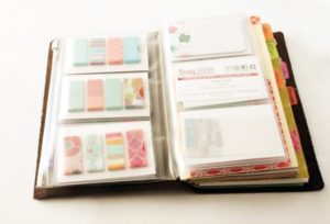 Pockets of washi tape and business cards.